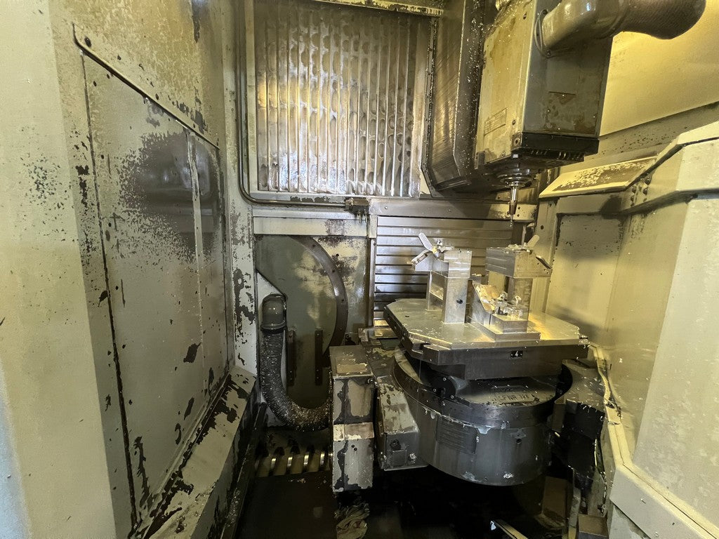 Centro di lavoro 5 assi pallettizzato DMG DMC 60T RS3 usato