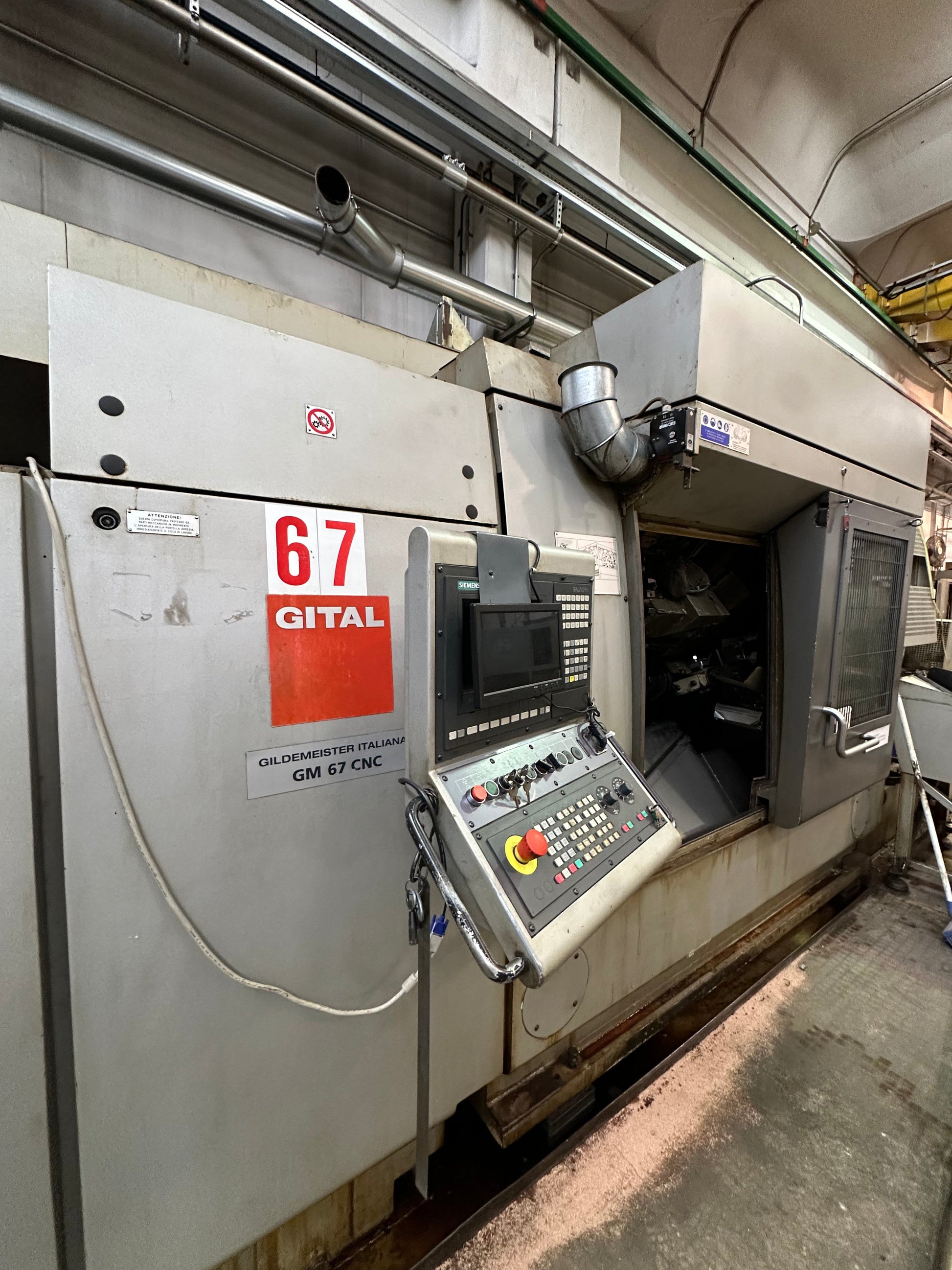 Tornio CNC Gildemeister GM 67 a 3 mandrini con caricatore IEMCA PRA 100/32 il Metalmeccanico Di M