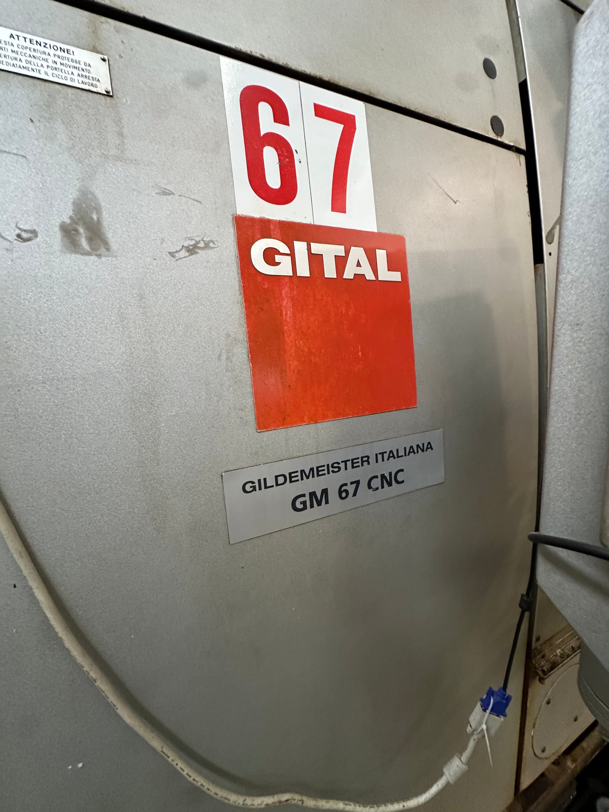 Tornio CNC Gildemeister GM 67 a 3 mandrini con caricatore IEMCA PRA 100/32 il Metalmeccanico Di M