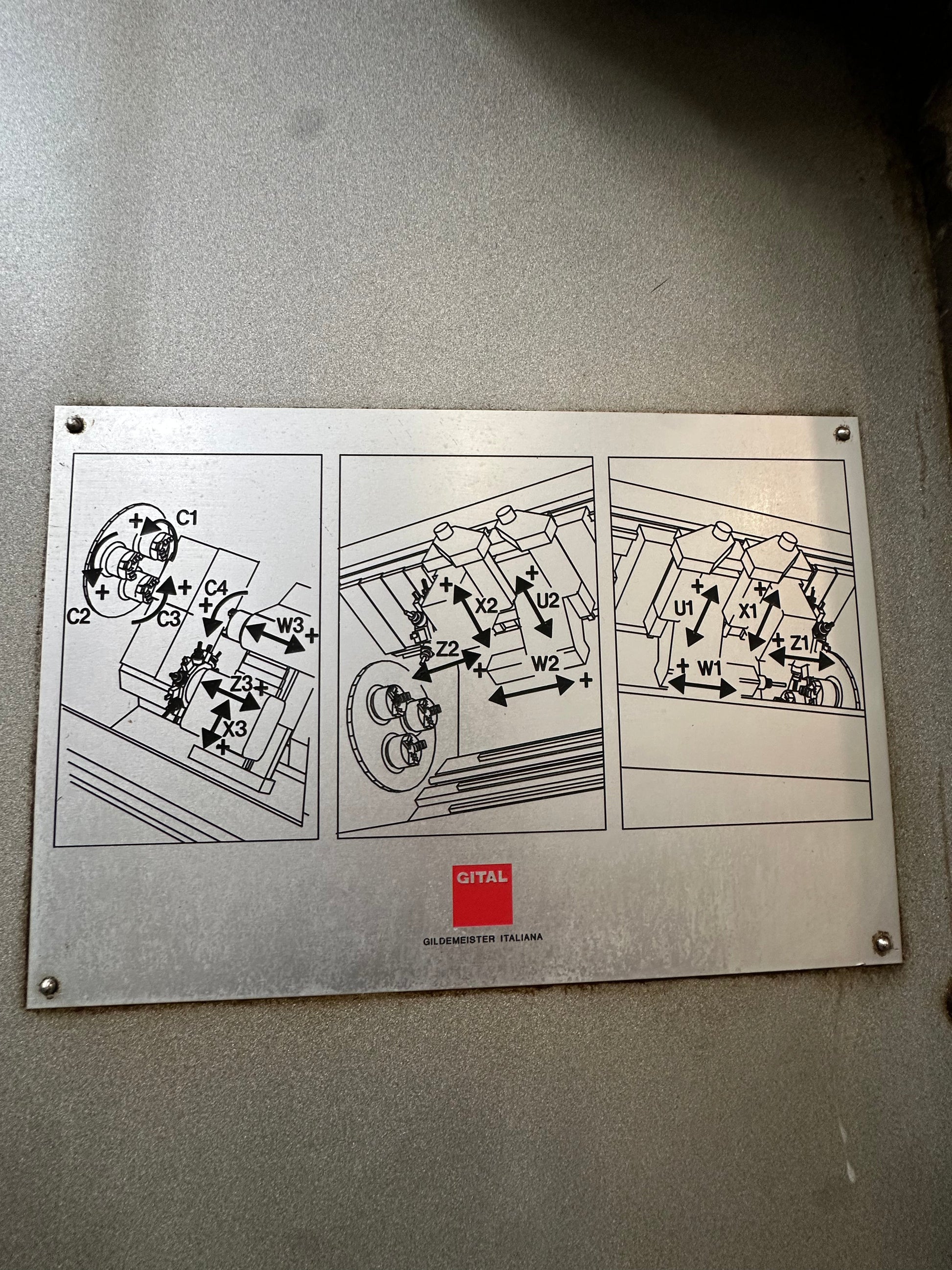 Tornio CNC Gildemeister GM 67 a 3 mandrini con caricatore IEMCA PRA 100/32 il Metalmeccanico Di M