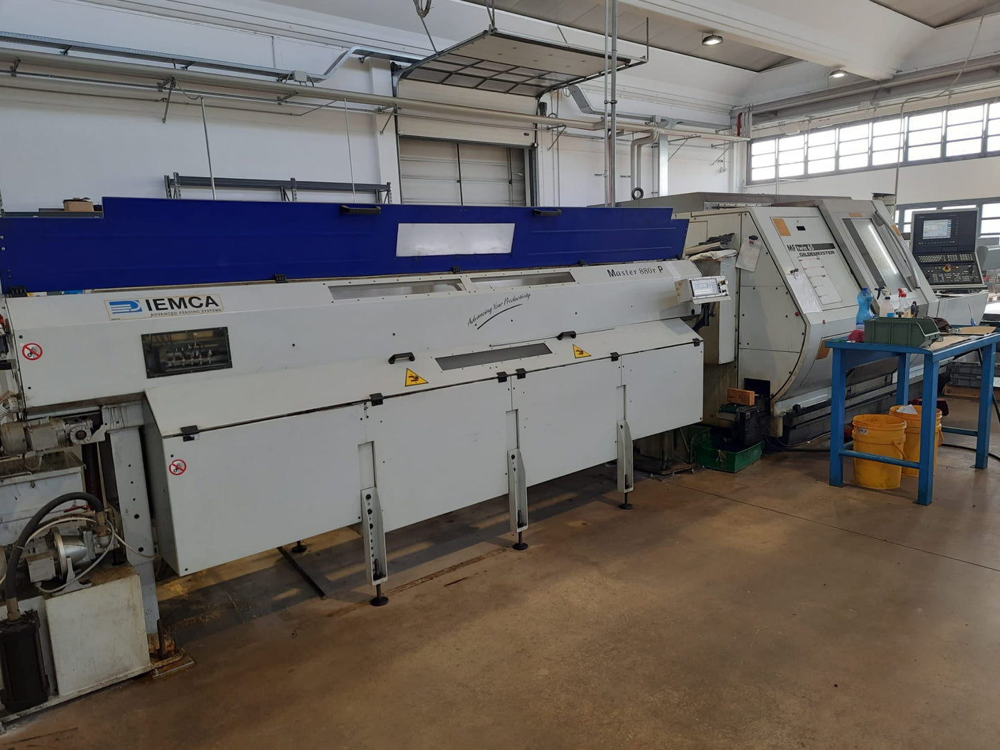 Tornio CNC bimandrino GILDEMEISTER MF Twin 65 usato con caricatore IEMCA il Metalmeccanico Di M