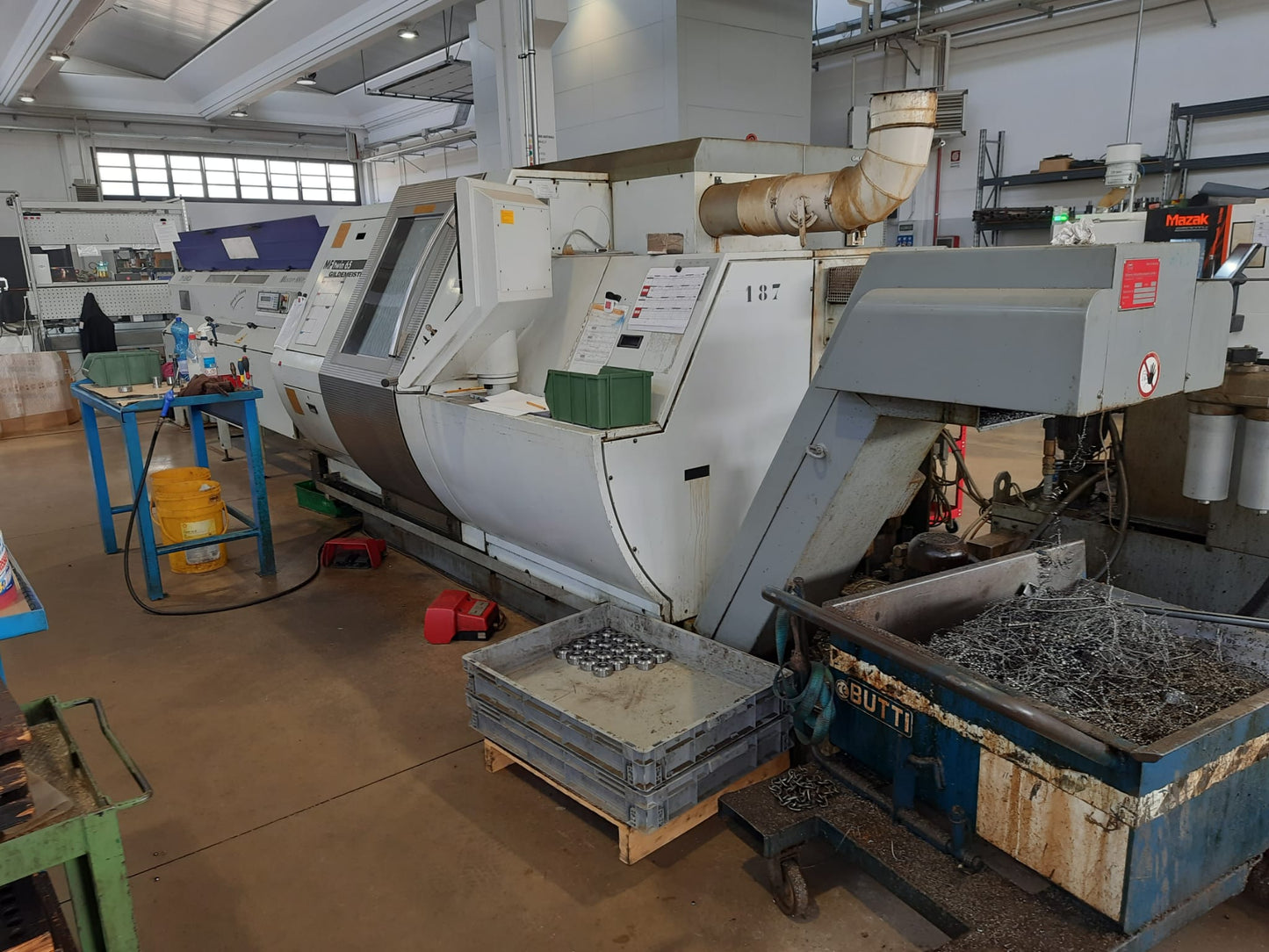Tornio CNC bimandrino GILDEMEISTER MF Twin 65 usato con caricatore IEMCA il Metalmeccanico Di M