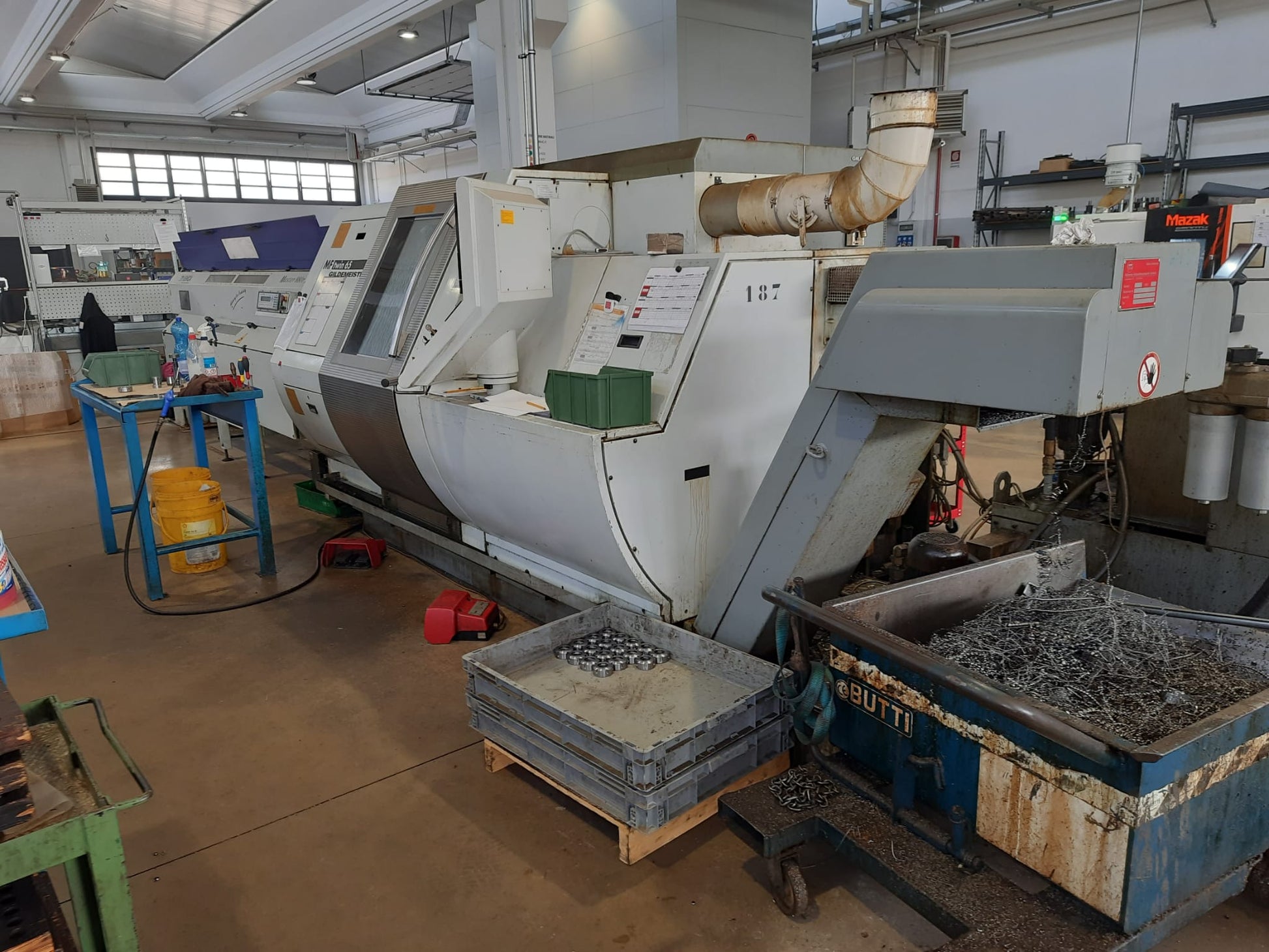 Tornio CNC bimandrino GILDEMEISTER MF Twin 65 usato con caricatore IEMCA il Metalmeccanico Di M
