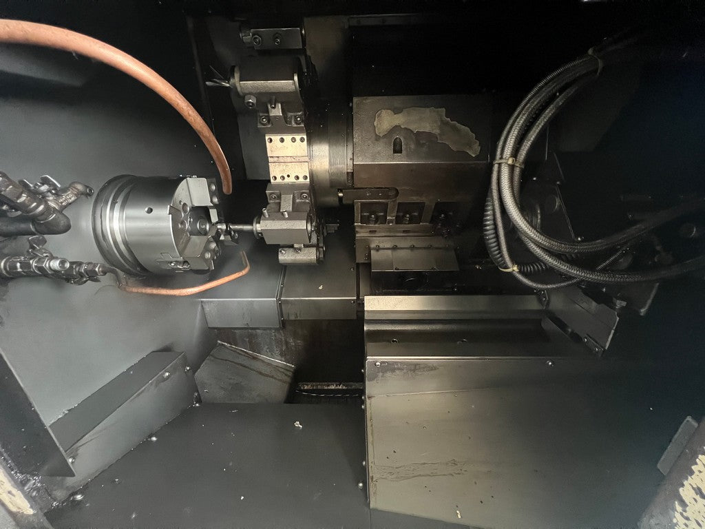Tornio cnc 2 assi TAKAMAZ X20 HI SERVER con gantry loader usato il Metalmeccanico Di M