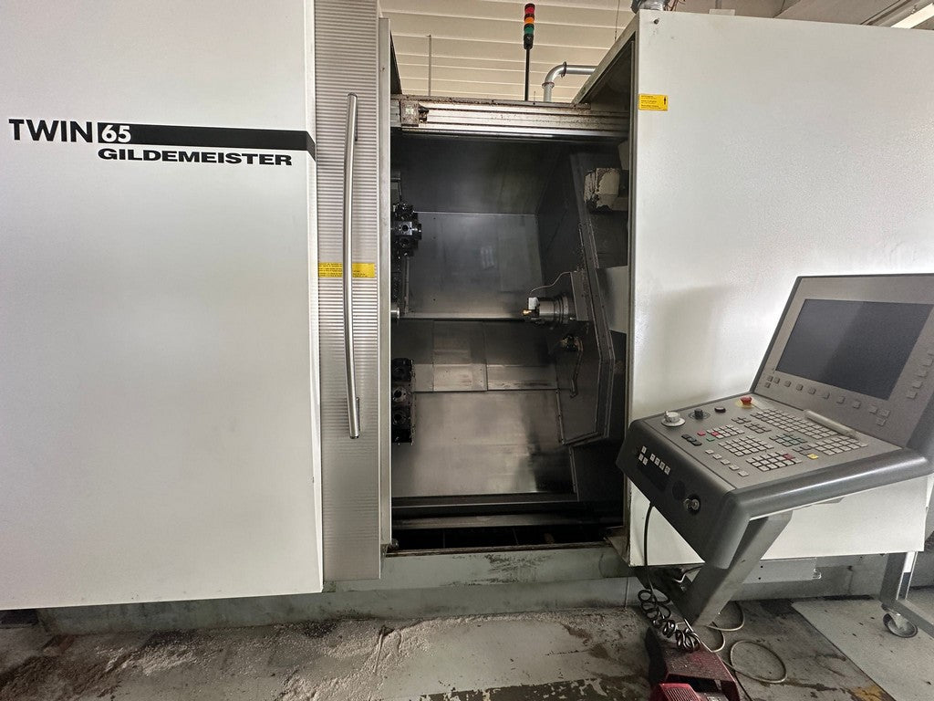 Tornio cnc GILDEMEISTER TWIN 65 bimandrino asse Y + B usato il Metalmeccanico Di M